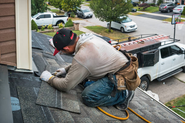 Professional Roofing technician working in Montauk, NY